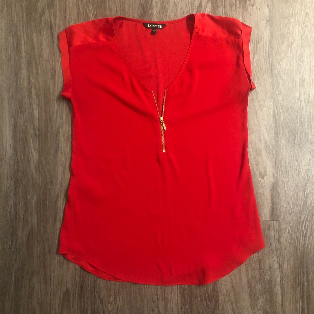 Express red zip top.